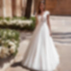 Lace top wedding dress with cap sleeves