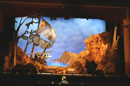 Conductor Mark Flint in the pit during the opening scene of 'Pirates of Penzance;' Photo by Ellen Appel.