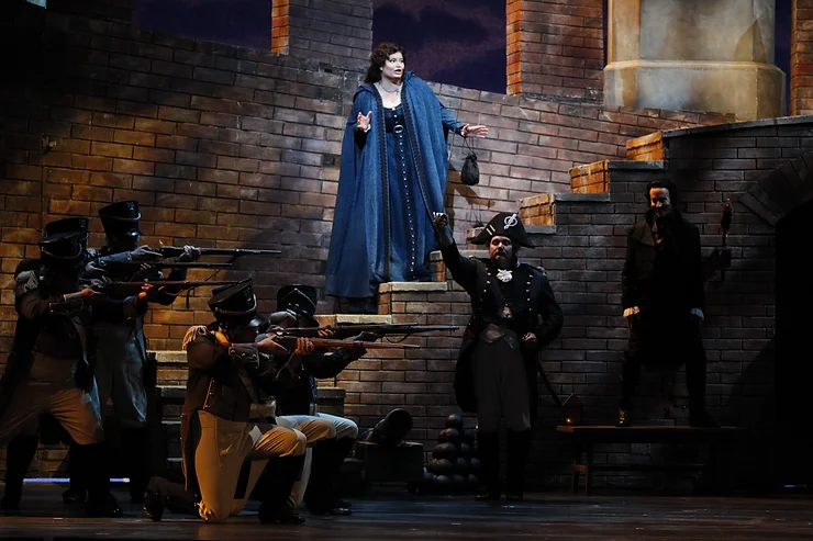 Floria Tosca (Carter Scott) with the execution squad at the firing range; photo by Ron Ennis.