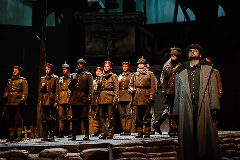 Soldiers line up for battle. The Fort Worth Opera Chorus in "Silent Night" 2014; photo by Karen Almond.