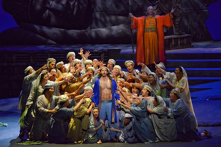 Lee Poulis (Zurga) and Justin Hopkins (Nourabad) with the chorus of 'The Pearl Fishers.' Photo by Karen Almond.
