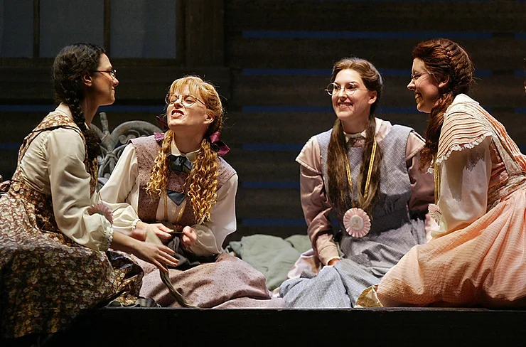The March sisters Jennifer Dudley as Jo, Sandra Piques Eddy as Meg, Tawny Seward as Beth, and Coral Owdom as Amy). Photo by Ellen Appel.
