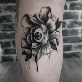 tatouage fleur oeil ésotérique black corner tattoo valence drôme