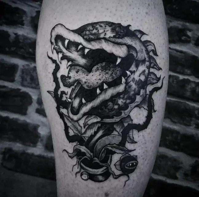 tatouage plante carnivore stylisé blackwork darkwork