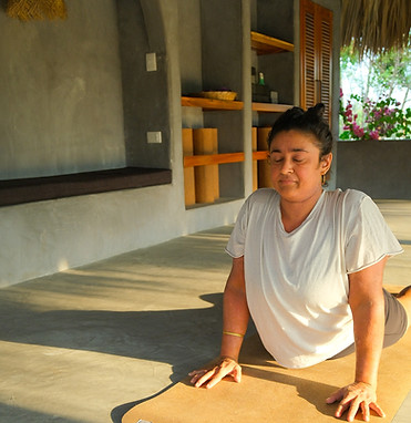 Sonal practicing yoga looking serene