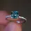 18K Gold Hidden Halo Teal Sapphire & Diamond Engagement Ring