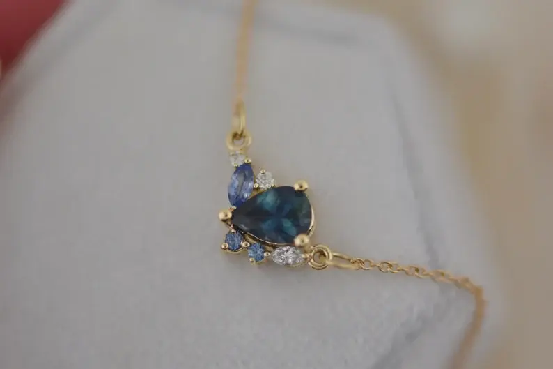Thumbnail: Elegant 18K Solid Gold Montana Sapphire Cluster Pendant Necklace