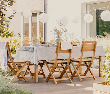 outdoor-dining-room-with-wooden-garden-furniture-s-2021-08-26-15-45-46-utc.jpg