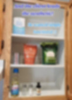 After - ADHD friendly, decluttered, organized kitchen cabinet of tea, spices, and snacks