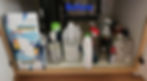 Before - Overwhelmed, cluttered, disorganized kitchen sink storage of cleaning products