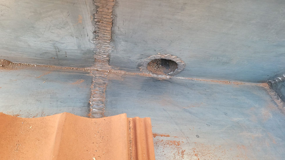 soudure à l'étain sur bac zinc, finition sur mesure d'un point d'évacuation
