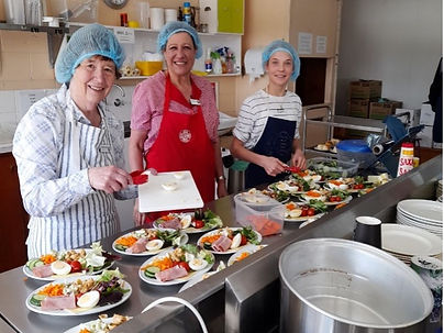 Volunteers making meals.jpg