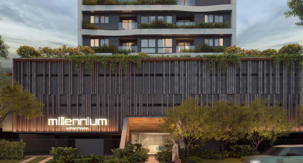 Perspectiva artística da fachada do Edf. Millennium da Exata Engenharia, exibindo uma torre residencial contemporânea com varandas de vidro, linhas retas e iluminação monumental.