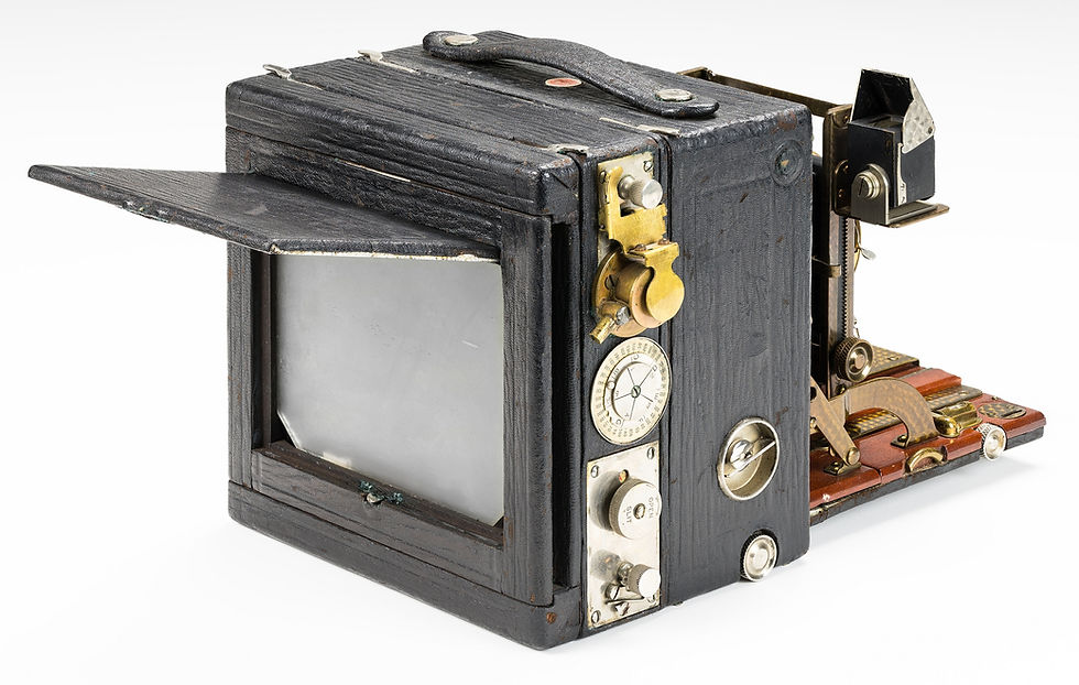 Rear view of the Premo Supreme showing the spring loaded viewing door and the TP shutter.
