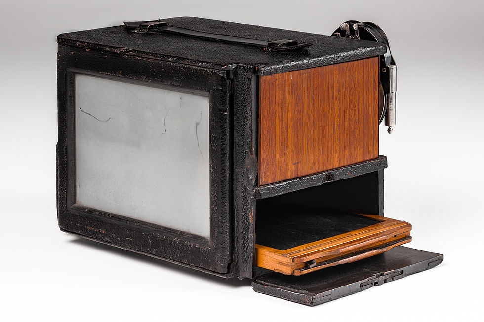 Rear view of the Montauk Flexo-Front Multiplying Camera showing the ground glass and side door opened to show plate holder storage.