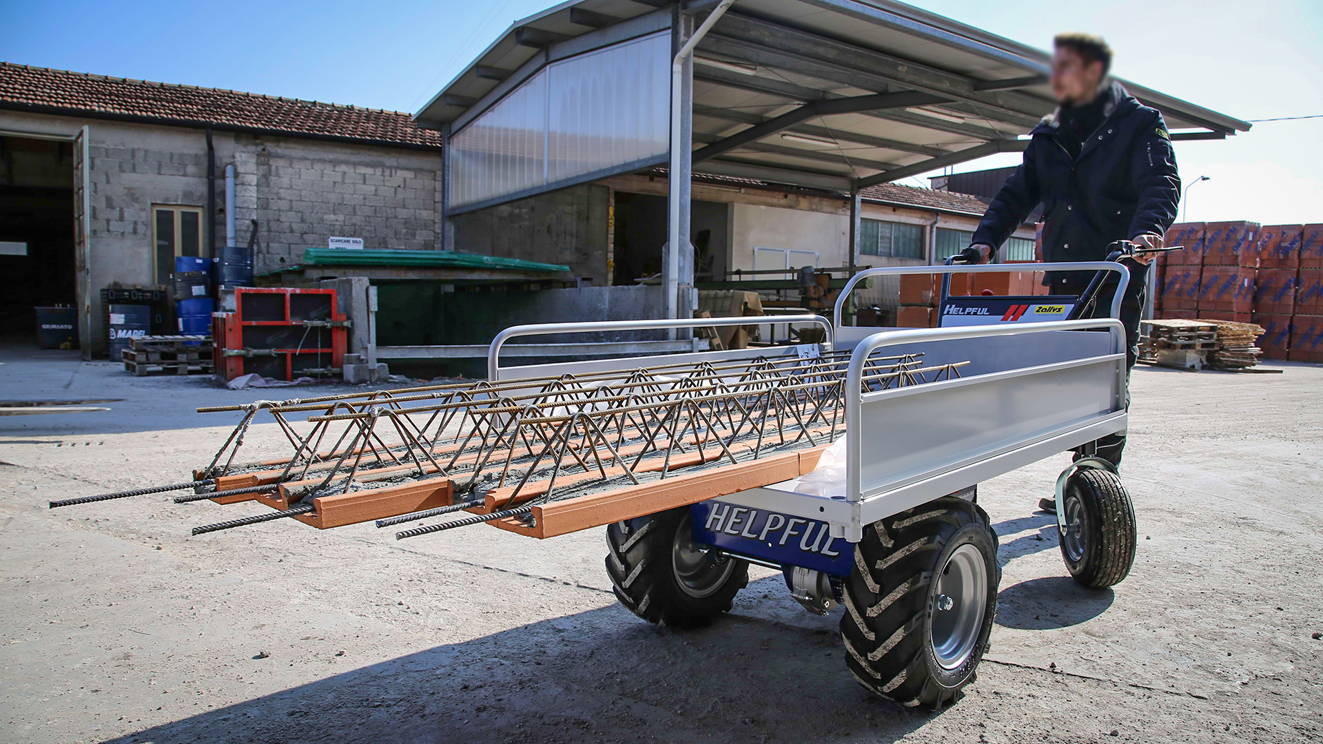 electric transporter carrying construction materials outdoors