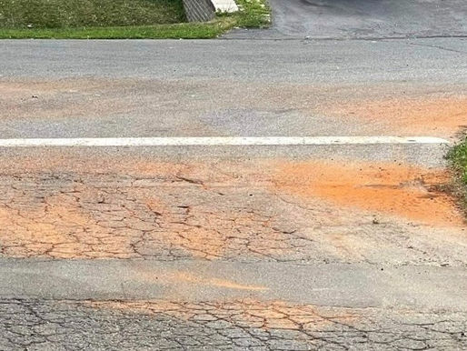 Rust forms on the streets of Beaconsfield due to the flushing of the water network