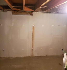 Brown Water Leaks Coming from the Tie Rod Holes in the basement wall