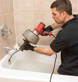 Drain Cleaner cleaning drains in the bathroom