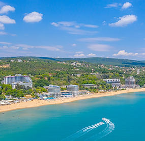 Stunning aerial view of the Black Sea coastline near Varna, with golden beaches, turquoise water, and beautiful seaside resorts, showcasing the area as a perfect vacation destination.