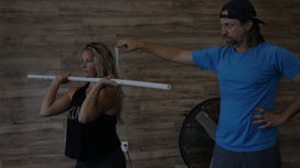 Vital Fitness Lakeland clients practicing exercise drills together in a small group fitness gym.