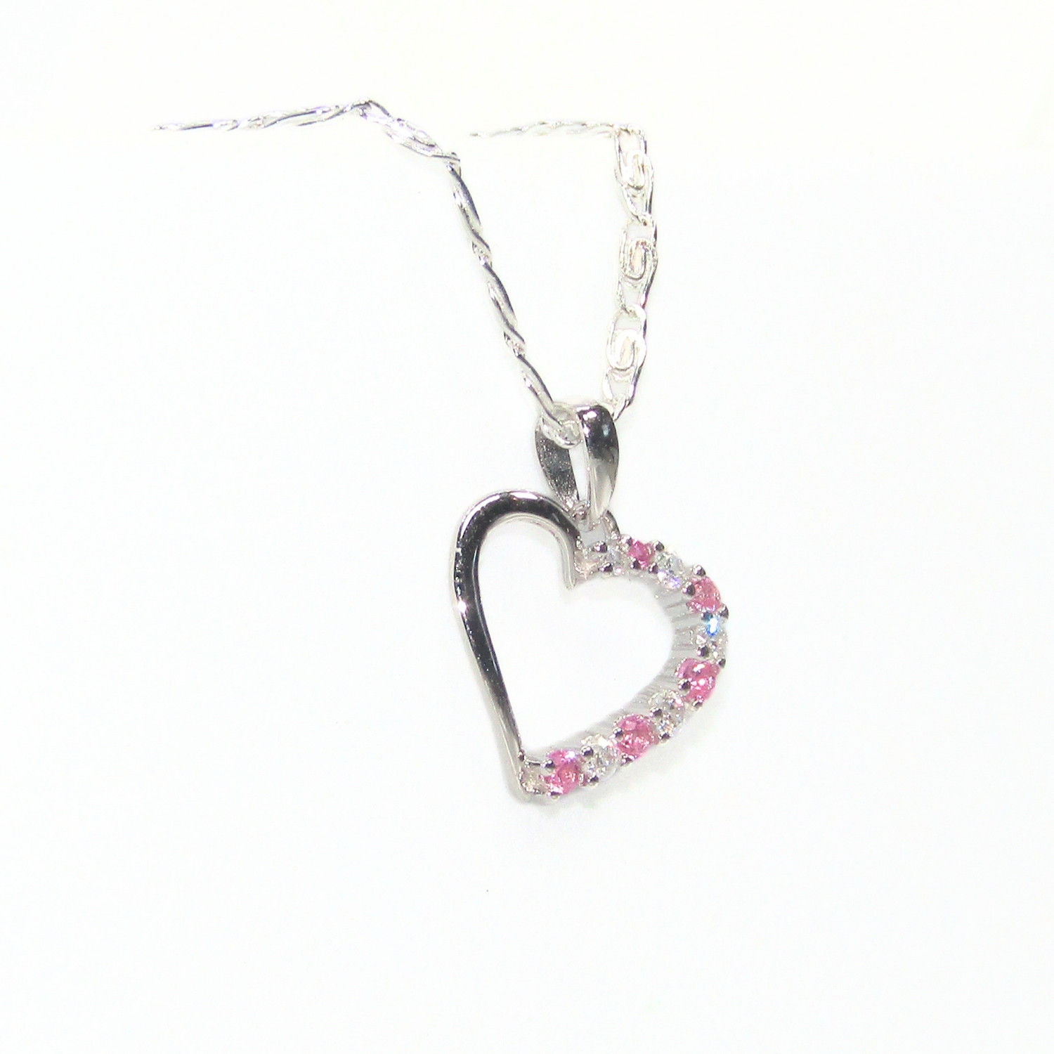Close-up of Sapphire Hearts Necklace with pink sapphire and zircon accents on a sterling silver chain.