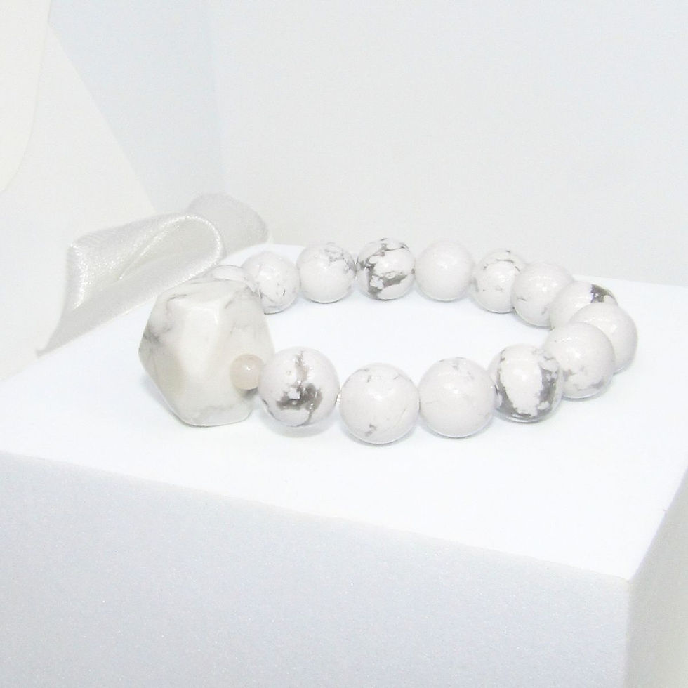 Thumbnail: Close-up of White Howlite 10mm beaded bracelet for calming energy.