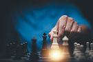 Business strategy competitive ideas concept, Chess game on chess board behind business bac