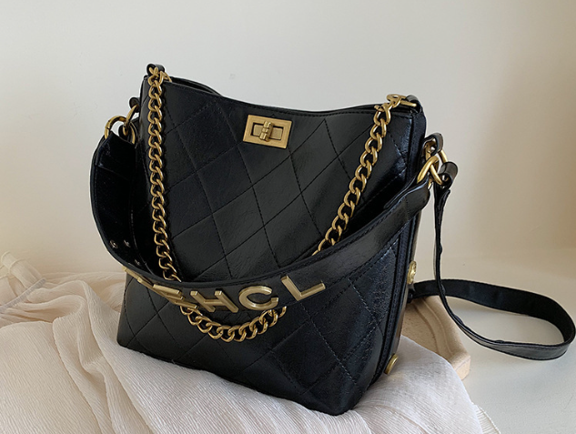 **Quilted Glam Duo – Quilted Bucket Bag with Chain and Crossbody Strap**