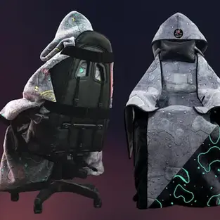 Level Up Wrap glow-in-the-dark gaming blanket with Neon Nexus pattern on a gaming chair