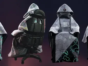 Level Up Wrap glow-in-the-dark gaming blanket with Neon Nexus pattern on a gaming chair