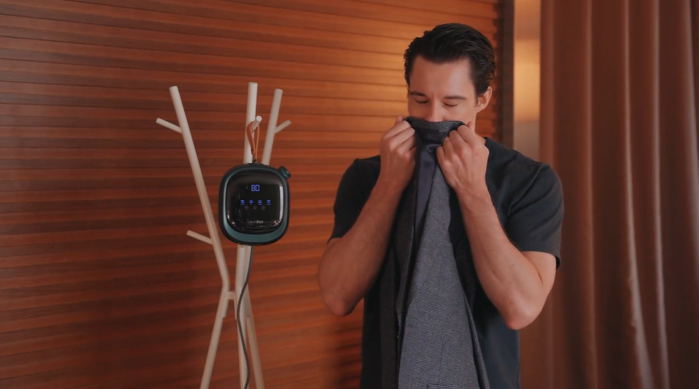 Portable clothes dryer with AI airflow system drying garments fast