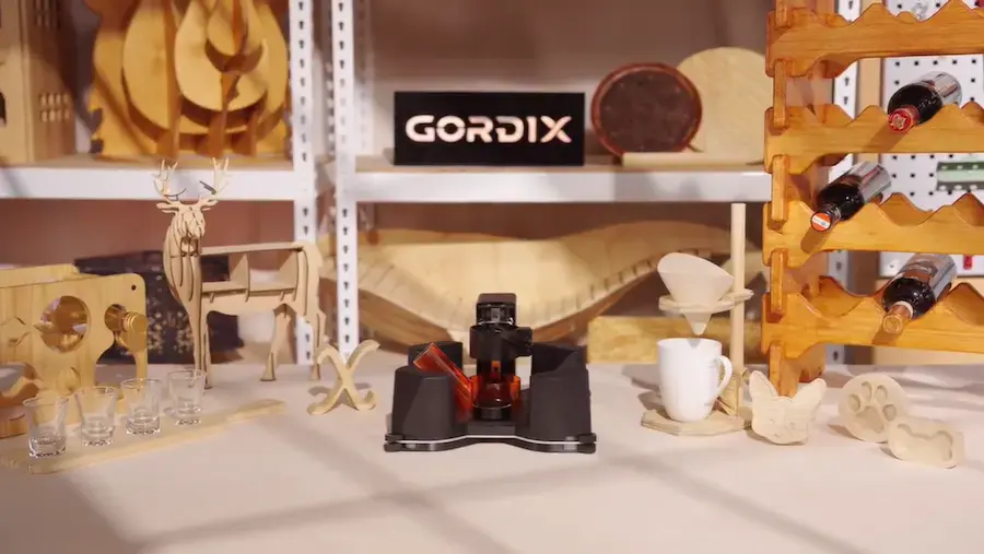 Gordix portable CNC on Kickstarter displayed with completed woodworking projects and prototypes