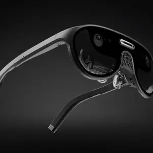 URXR One glasses viewed from the inside, with the optical modules, sensors, nose pads, and cable connection visible.