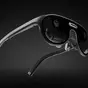 URXR One glasses viewed from the inside, with the optical modules, sensors, nose pads, and cable connection visible.