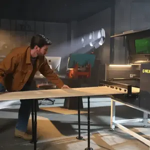 Gweike MCore laser cutter on Kickstarter using the intelligent conveyor for oversized material feeding