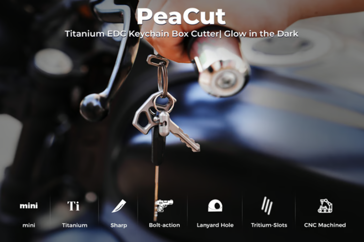 PeaCut titanium keychain box cutter with bolt-action blade