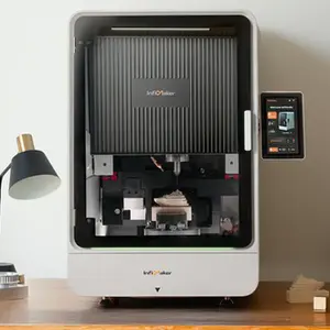 InfiMaker K1 5-axis CNC with enclosed machining area, touchscreen controls, and a workpiece mounted inside.