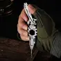 KeyMaster 3.0 multitool keychain on Kickstarter used as a magnetic bit driver
