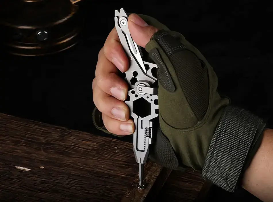 KeyMaster 3.0 multitool keychain on Kickstarter used as a magnetic bit driver