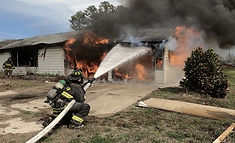 HEN 265 structural nozzle attacking a garage fire