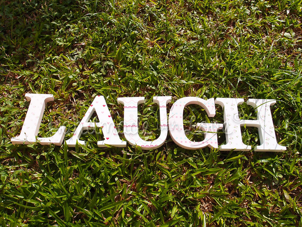 L-A-U-G-H prop