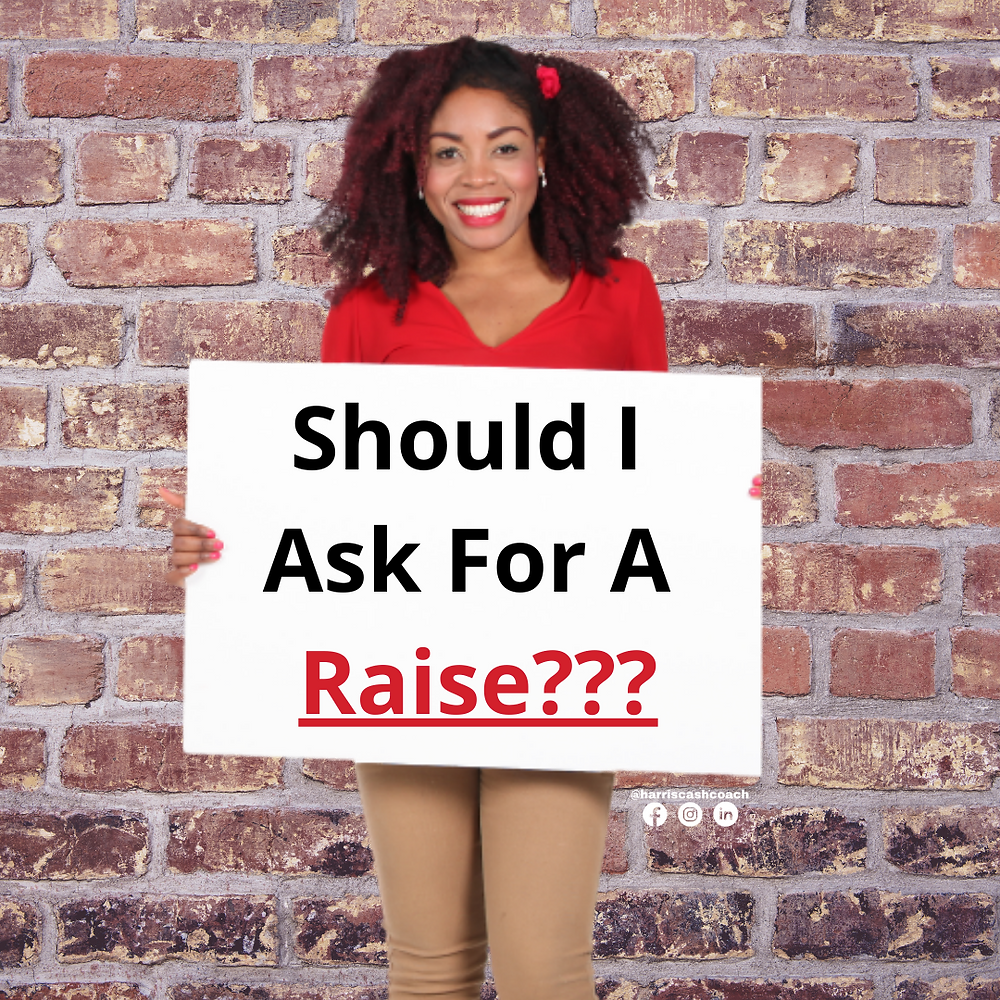 Woman holding sign that says should I ask for a raise.