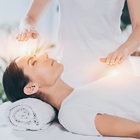 side view of calm young woman receiving reiki healing therapy on head and chest _edited.pn