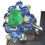 Miniature : Bague Marguerite émeraude saphir et diamants