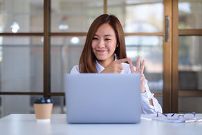 beautiful-businesswoman-using-laptop-computer-working-online-video-conference.jpg
