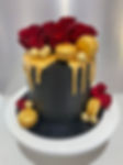 Black gol red celebration cake