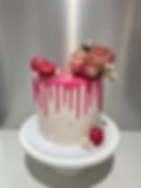 pink drip buttercream tall cake