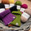 Thumbnail: close up image of basket of coloured yarn and dog snoods