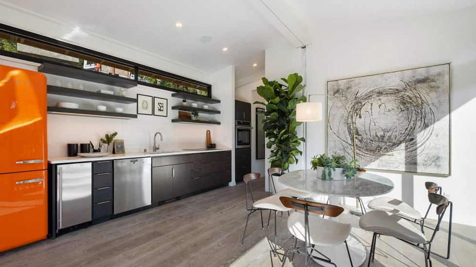 Humble Creek Construction modern modular open concept living space and linear kitchen with orange retro refrigerator